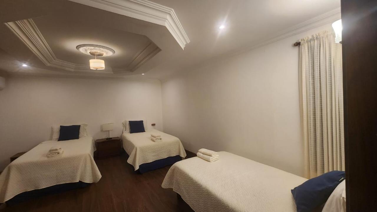 Plaza Lobos Suites San Cristobal Exterior photo