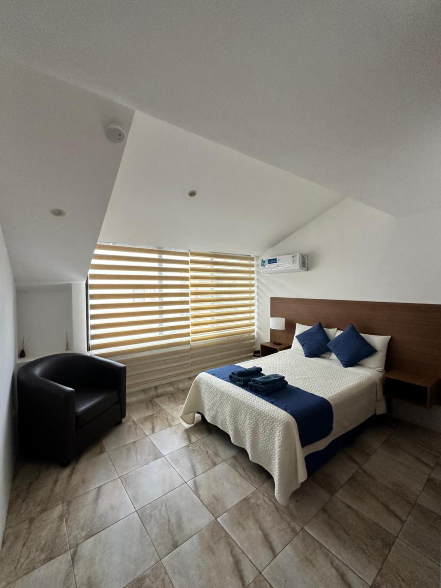 Plaza Lobos Suites San Cristobal Exterior photo