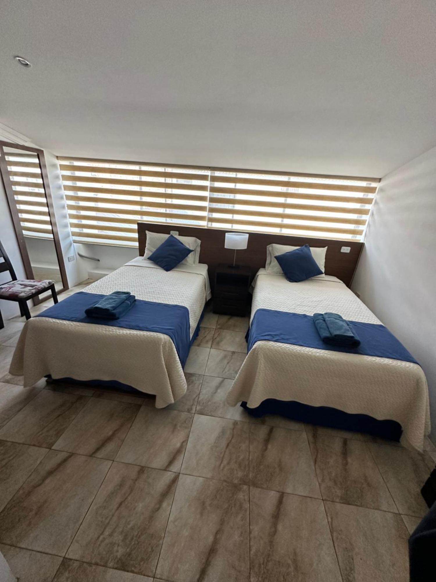 Plaza Lobos Suites San Cristobal Exterior photo